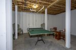 ping pong table area in basement